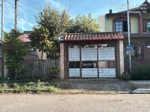 Casa em Alvorada, Jardim Algarve, Rua Beijaflores, N. 33, Lt 32 Qd 29, RS. Área: 43.4m2