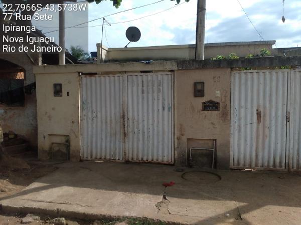 Casa em Nova Iguaçu, Ipiranga, Rua Sete, N. 52, Lt 06qd Xiii, RJ. Área: 32.74m2