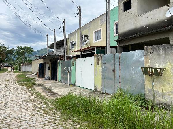 Casa em Nova Iguaçu, Cabucu, Rua Cinco, N. 14, Lt 01, Qd X, RJ. Área: 51.18m2