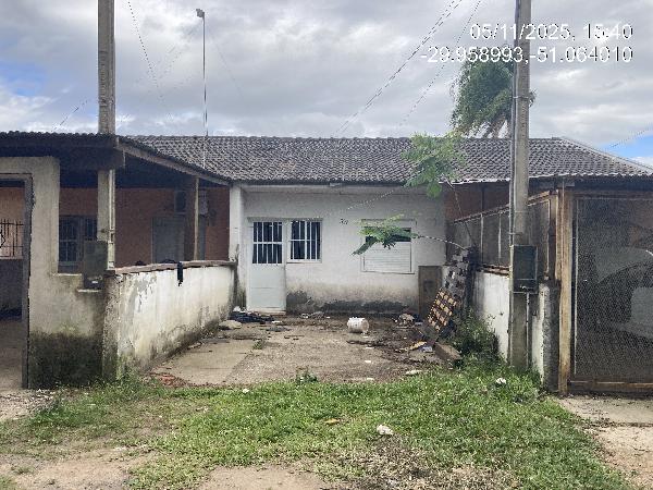 Casa em Gravataí, Novo Mundo, Rua Tiburcio Oliveira, N. 386, Cs 04 Lt 18 Qd 14, RS. Área: 51.26m2