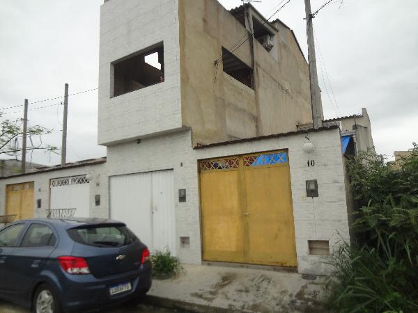 Casa em Nova Iguaçu, Marapicu, Rua Onze, N. 10, Lt 34 Qd M, RJ. Área: 33.22m2