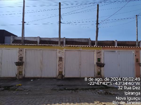 Casa em Nova Iguaçu, Ipiranga, Rua Dez, N. 40, Lt 31 Qd I, RJ. Área: 35.4m2